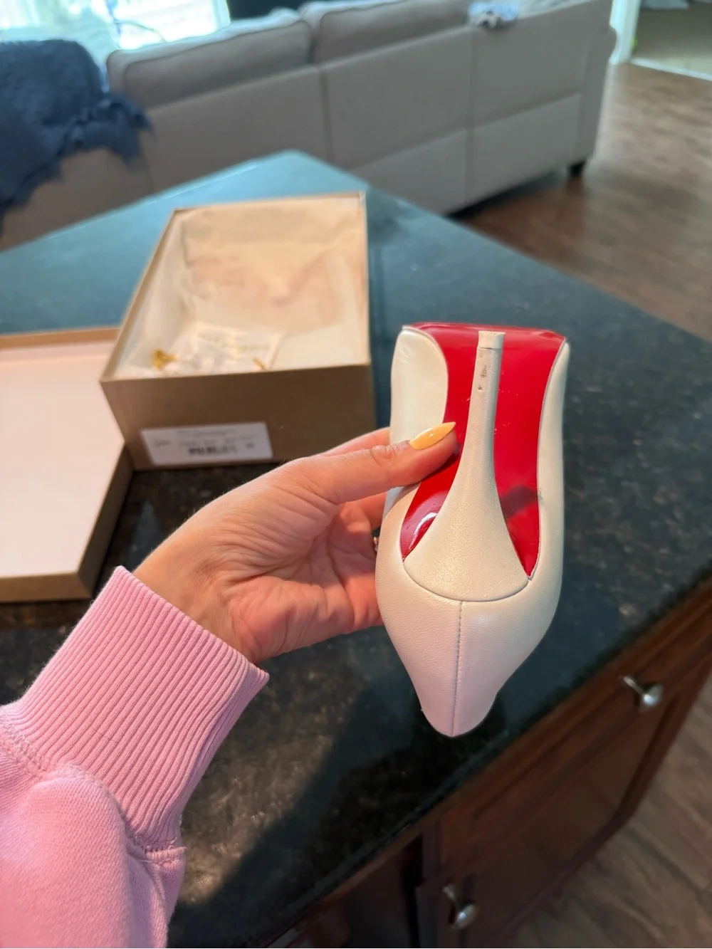 Christian Louboutin White Pointed-Toe Pump with Signature Red Sole